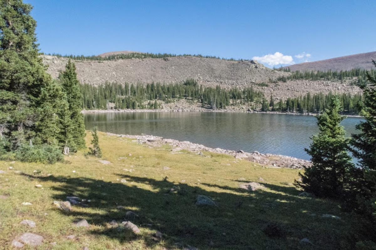 Owned and operated by the Ouray Park Irrigation Company, Whiterocks Lake is an important irrigation water storage facility in the Whiterocks River drainage